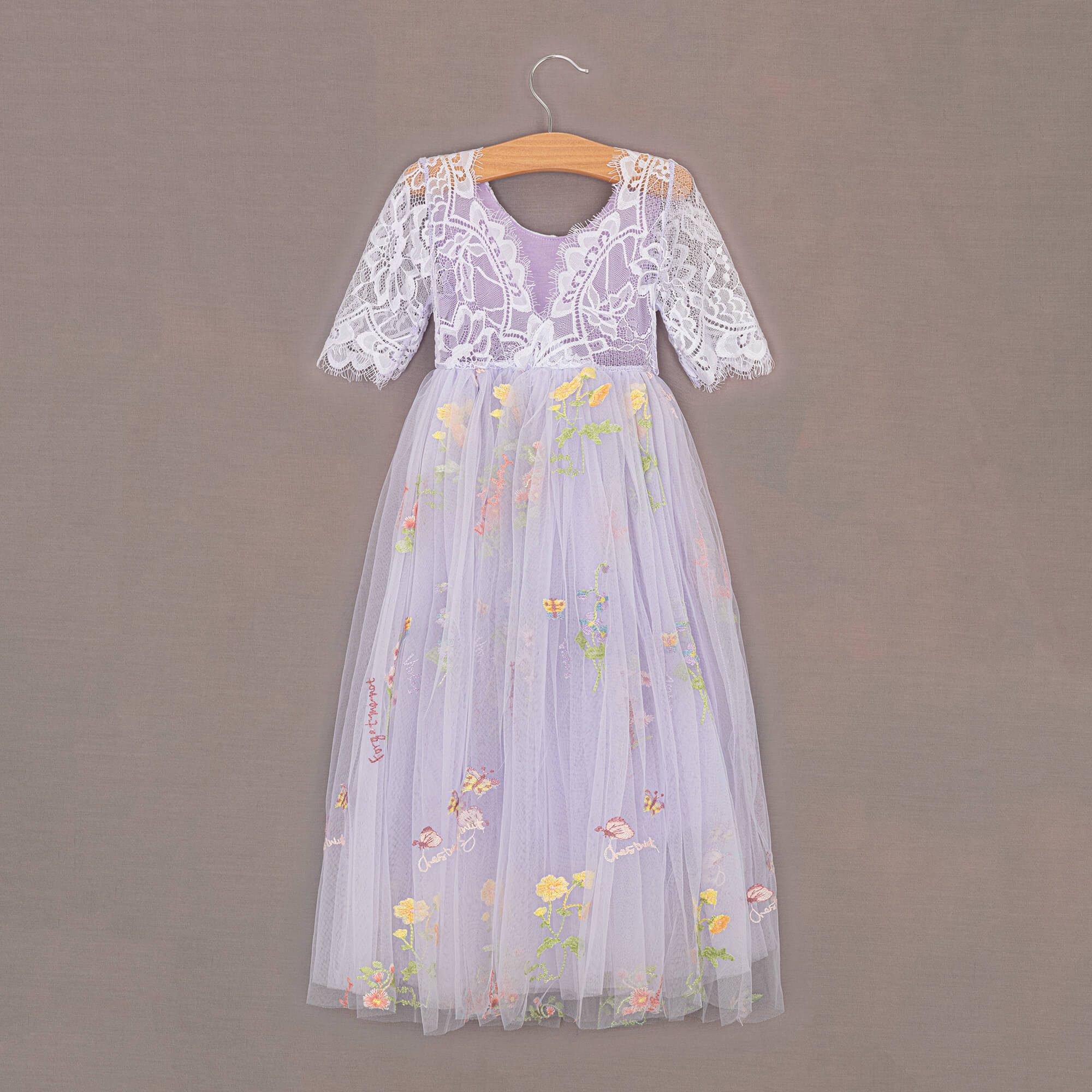 Rear of Lilac dress with embroidery detail