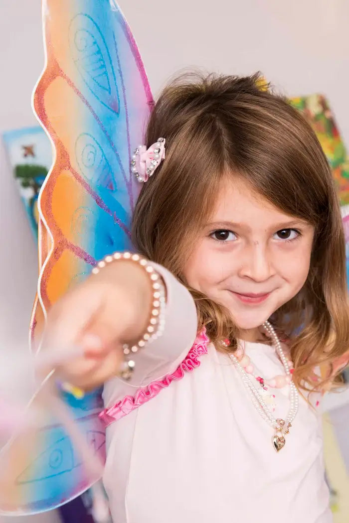 pretty young girl wearing fairy wings