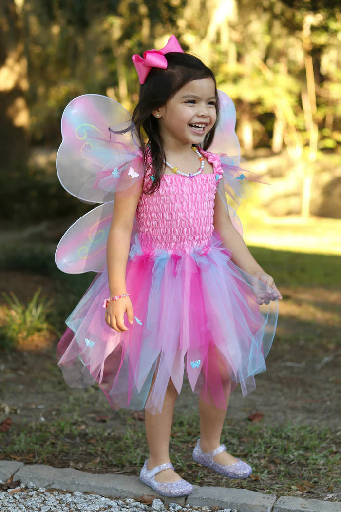 Young girl smiling dressed as a fairy