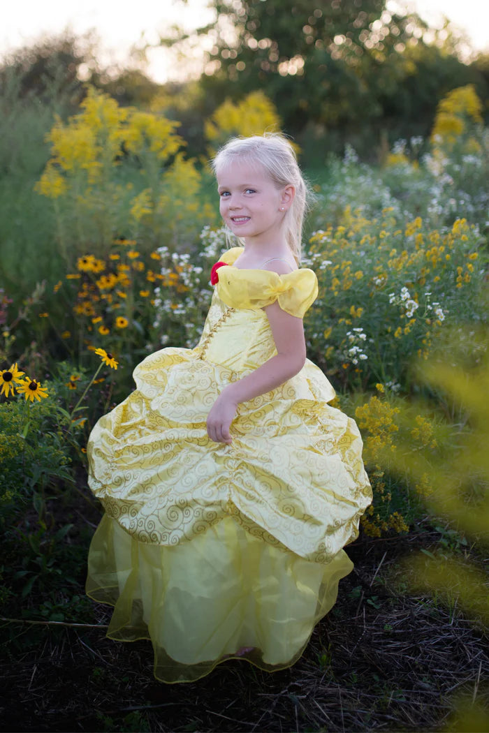 Young girl playing in garden