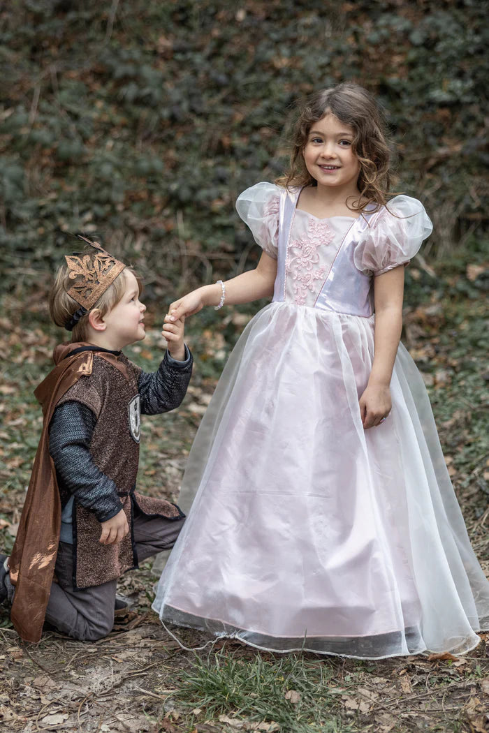 young child playing dress up