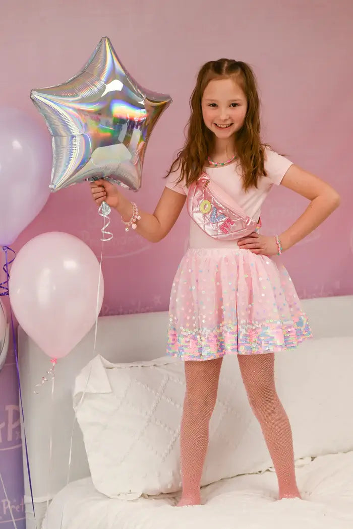 young girl wearing sequin skirt from The Fairy Princess