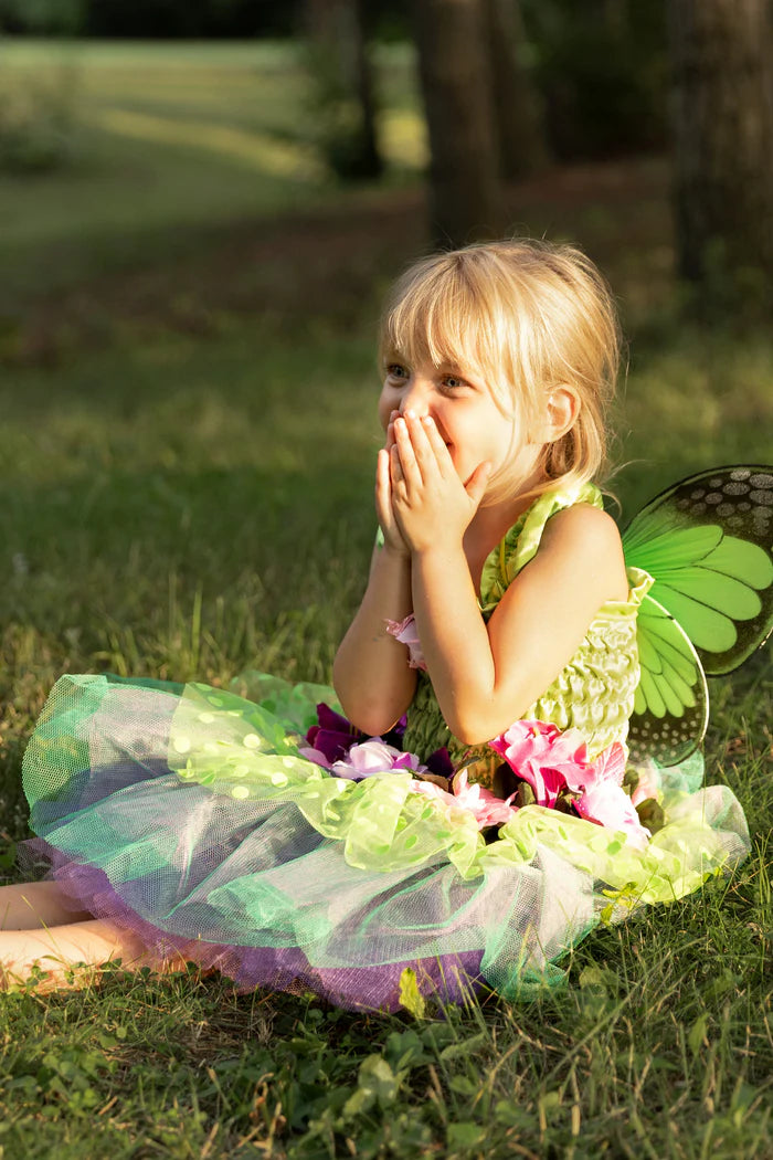young girl sat on ground