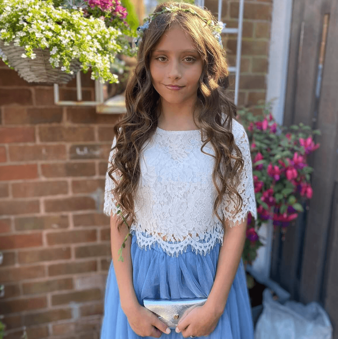 close up of lace top on child
