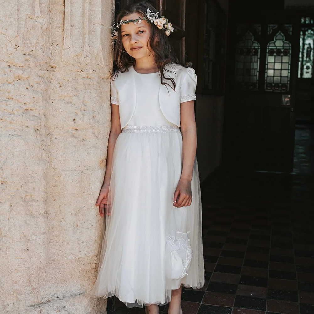 Flower Girl wearing Harper Dress in a church