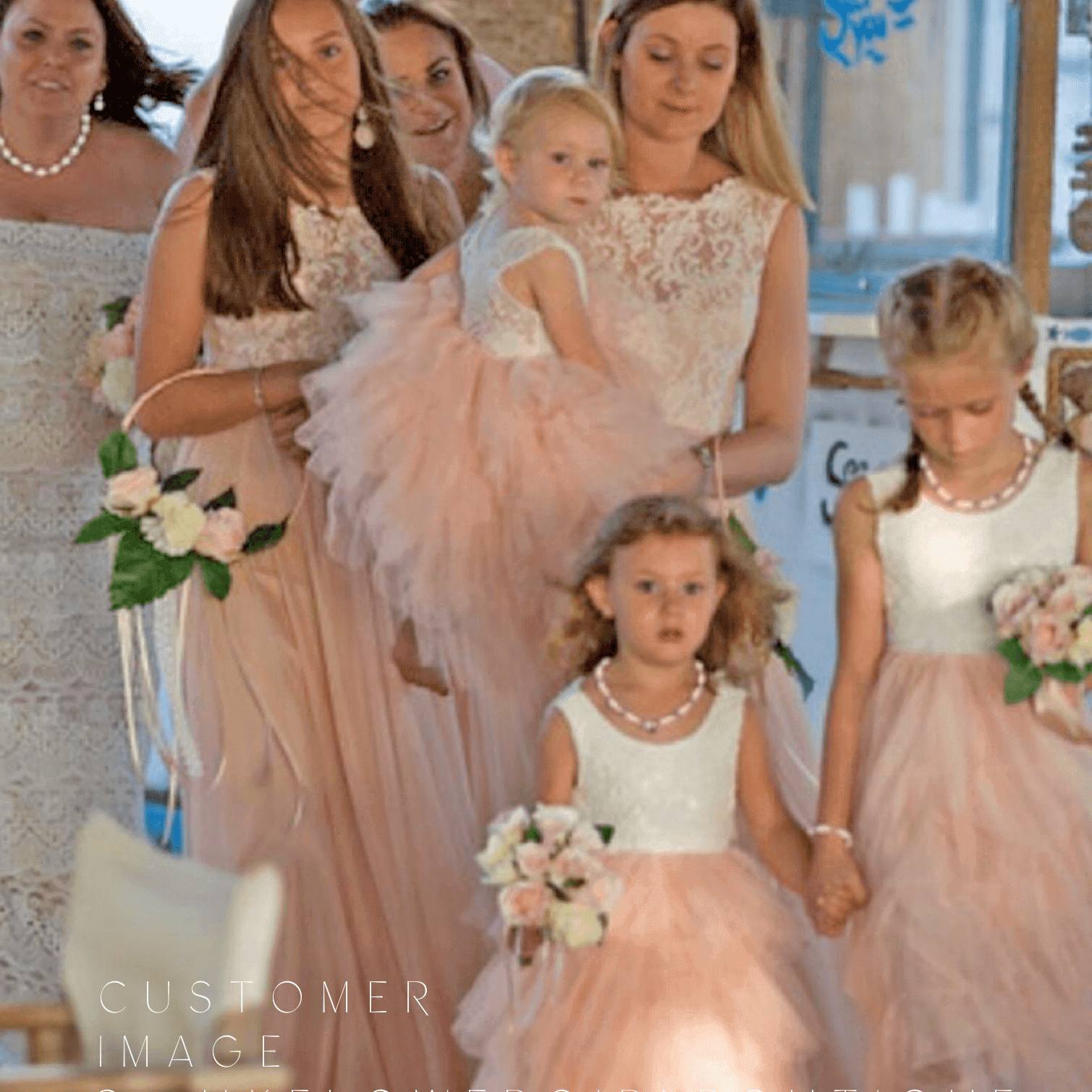 wedding party in blush colours dresses