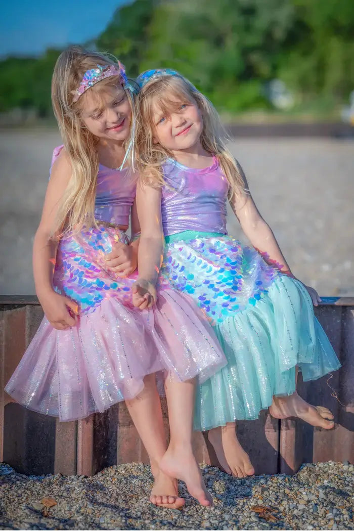 two girls playing as mermaids