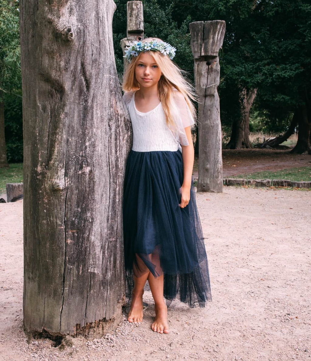 young flower girl in wedding grounds