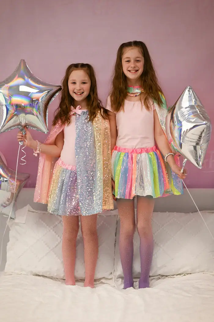 girls in matching sequin tutu sets