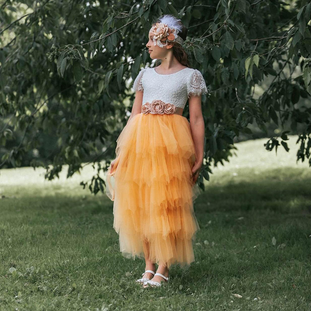 Flower Girl standing by trees