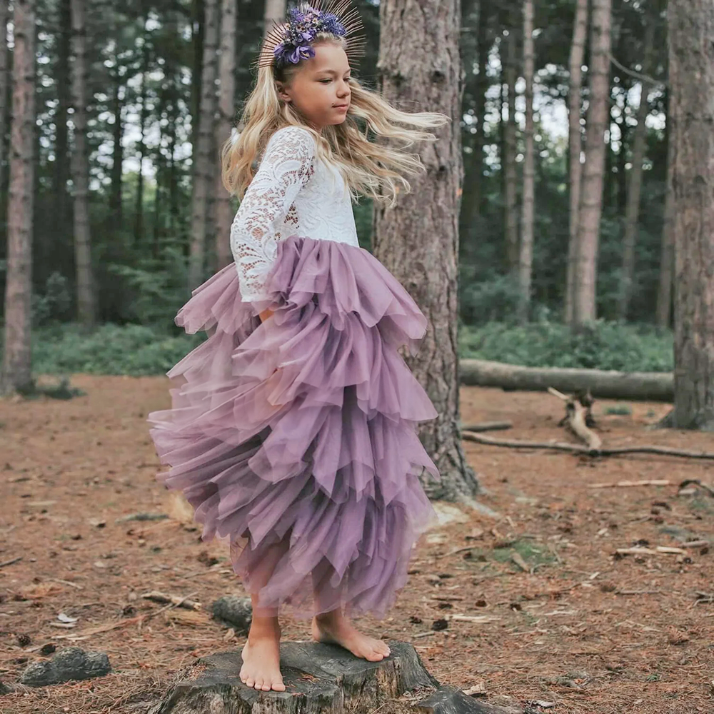 Girl dancing in flower girl dress