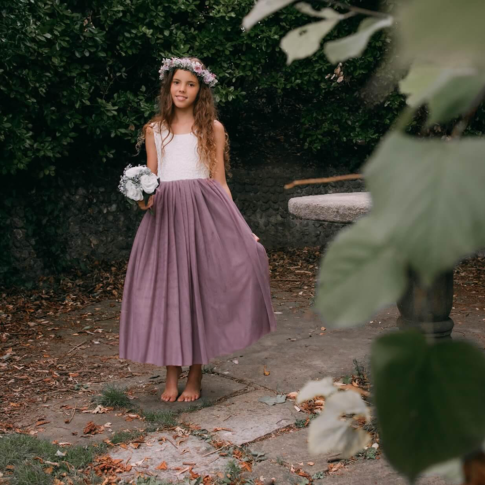 Flower girl holding flowers