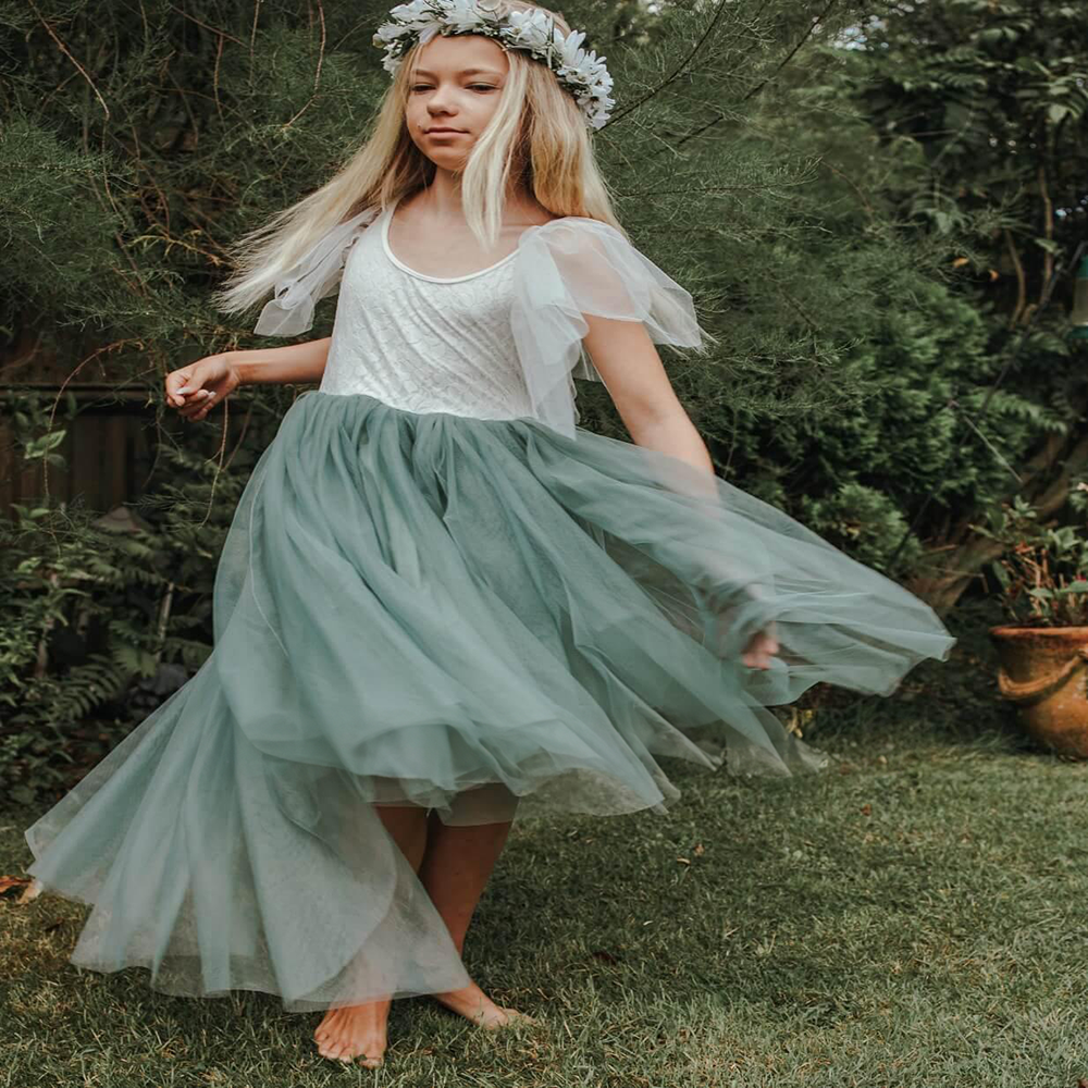 girl wearing a sage Bohemian Serendipity Dress