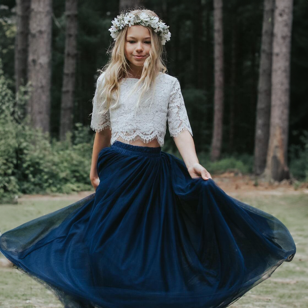 Pretty flower girl in woods