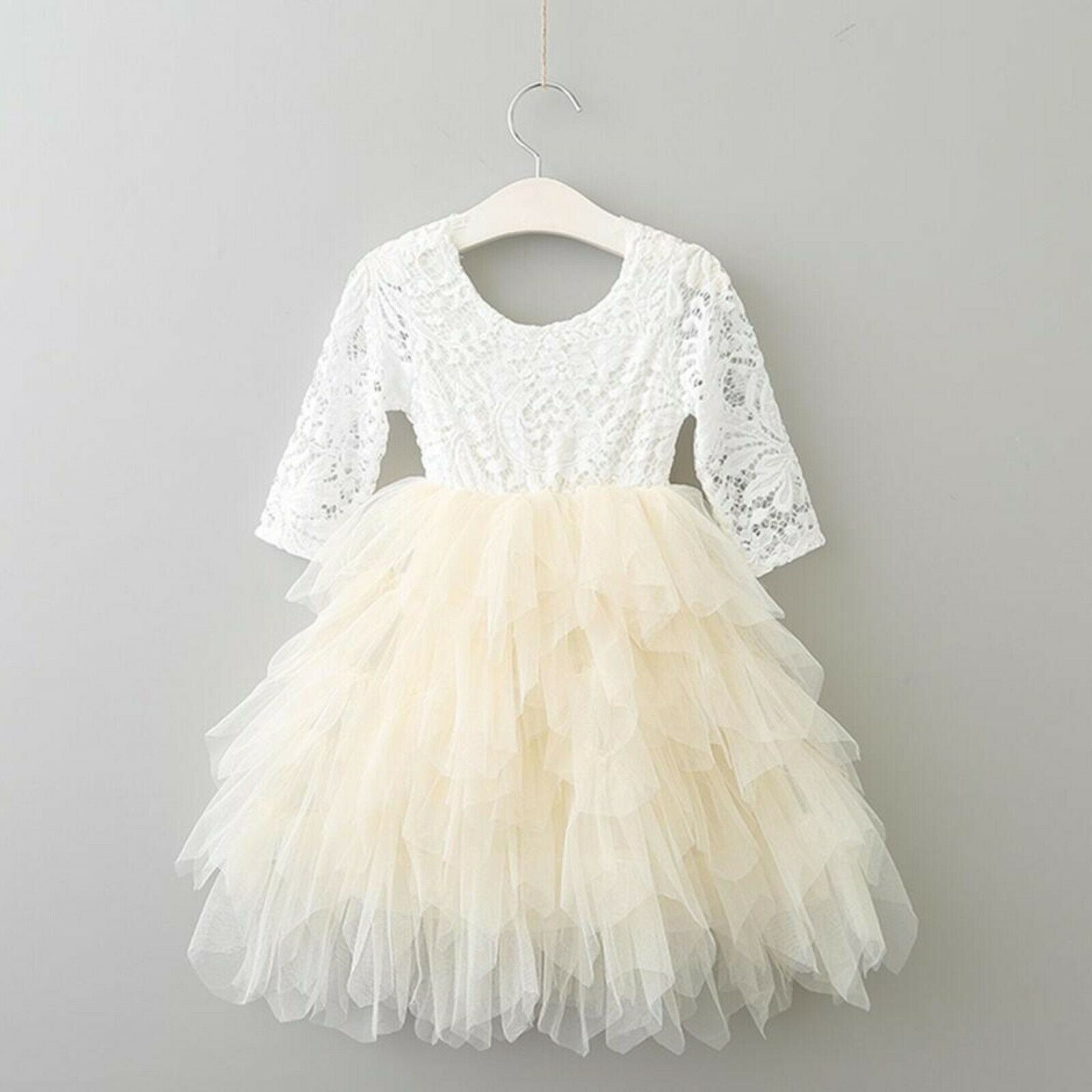 pretty ivory dress hanging