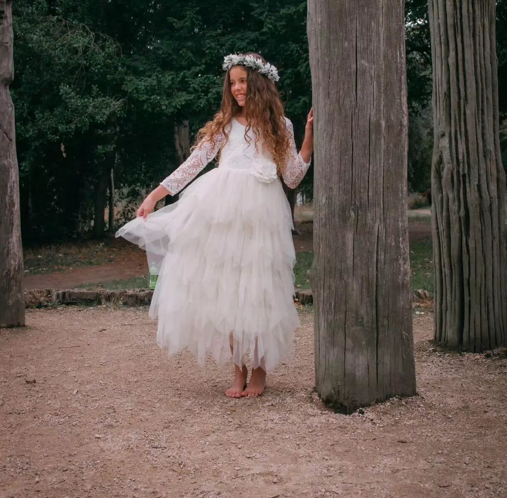 young girl wearing flower girl dress