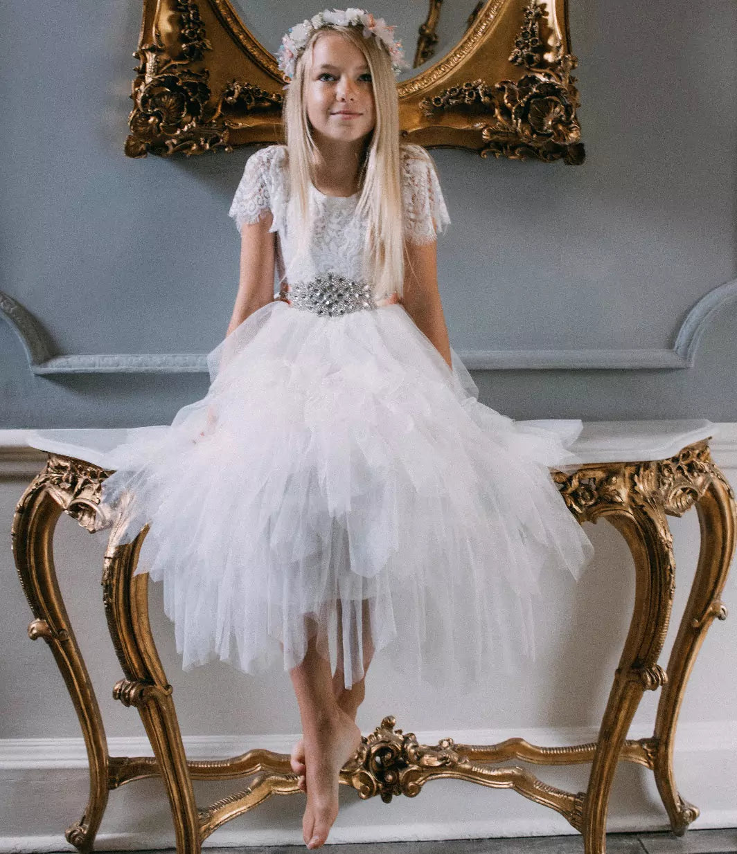 flower girl sat on table
