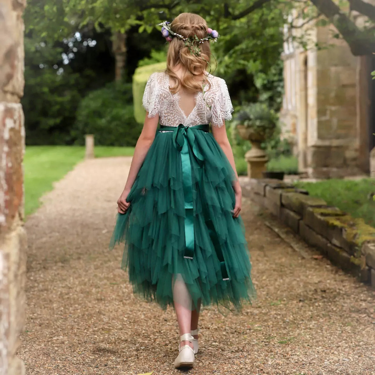 model walking away showing back of the dress