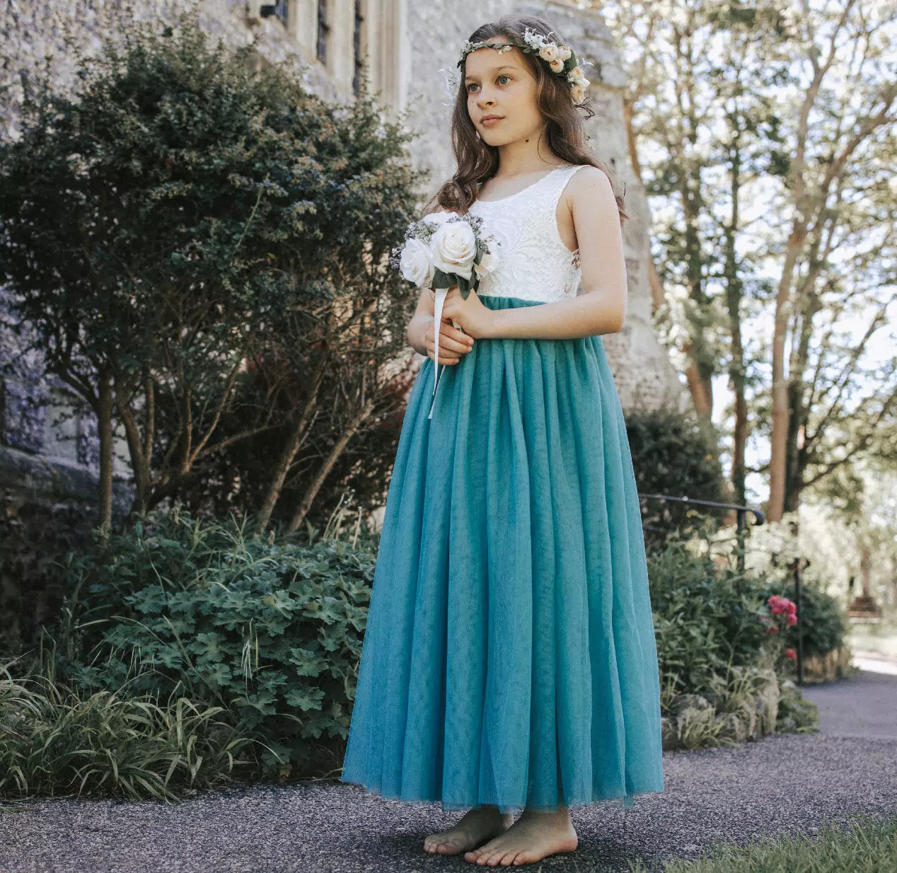 Young flower girl at wedding