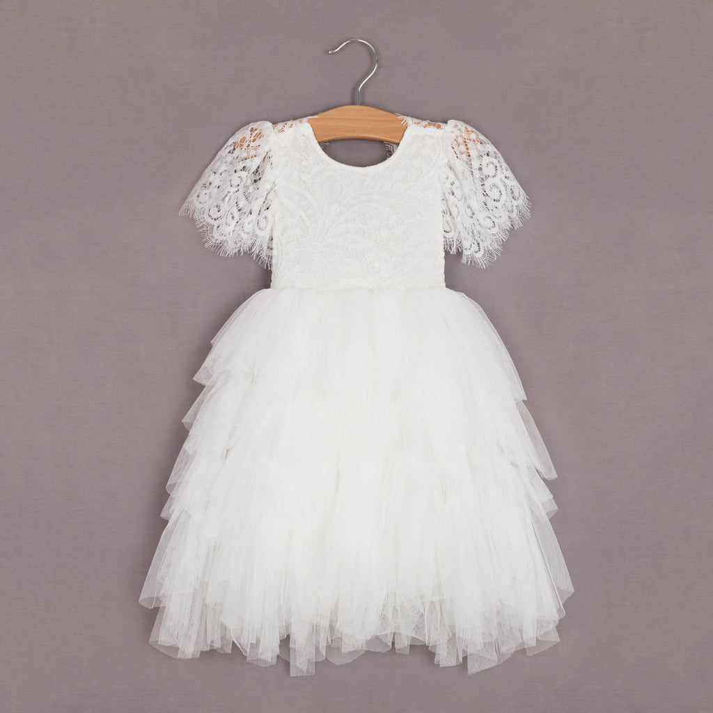 white pretty dress on hanger