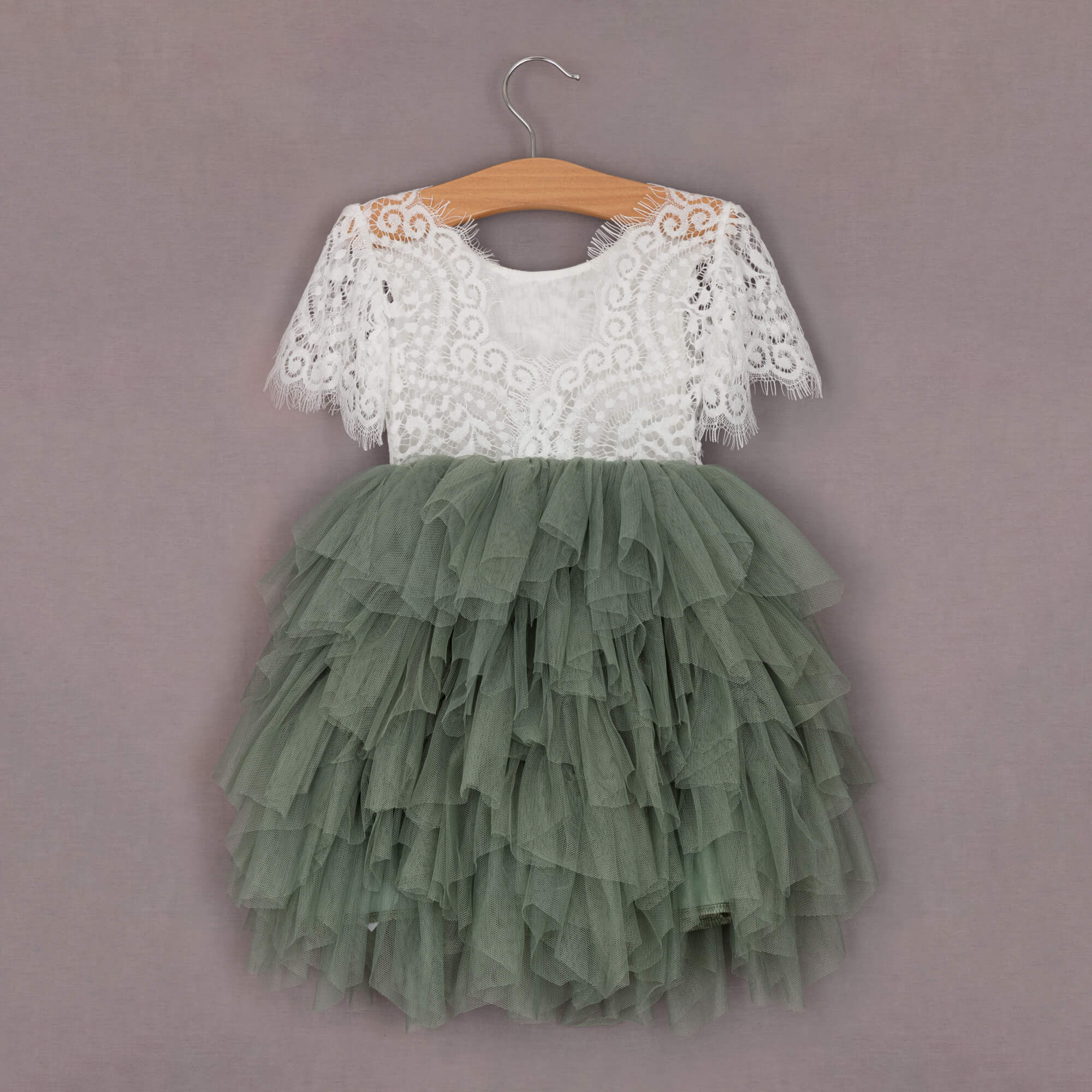 Baby girls dress hanging up