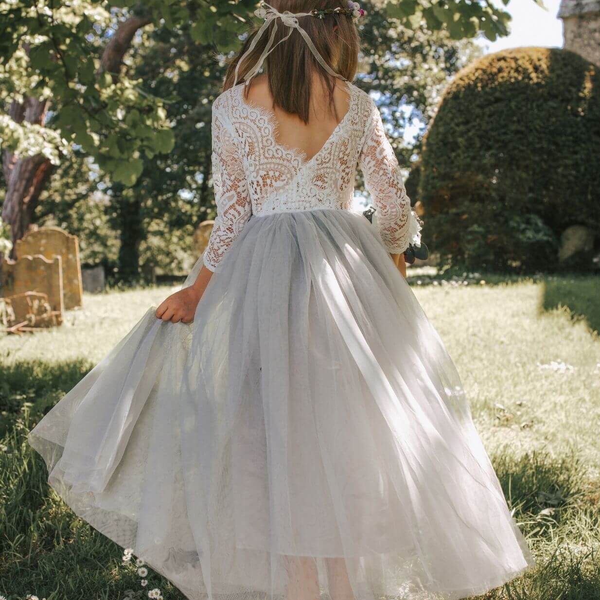 Flower girl swirling in the dress