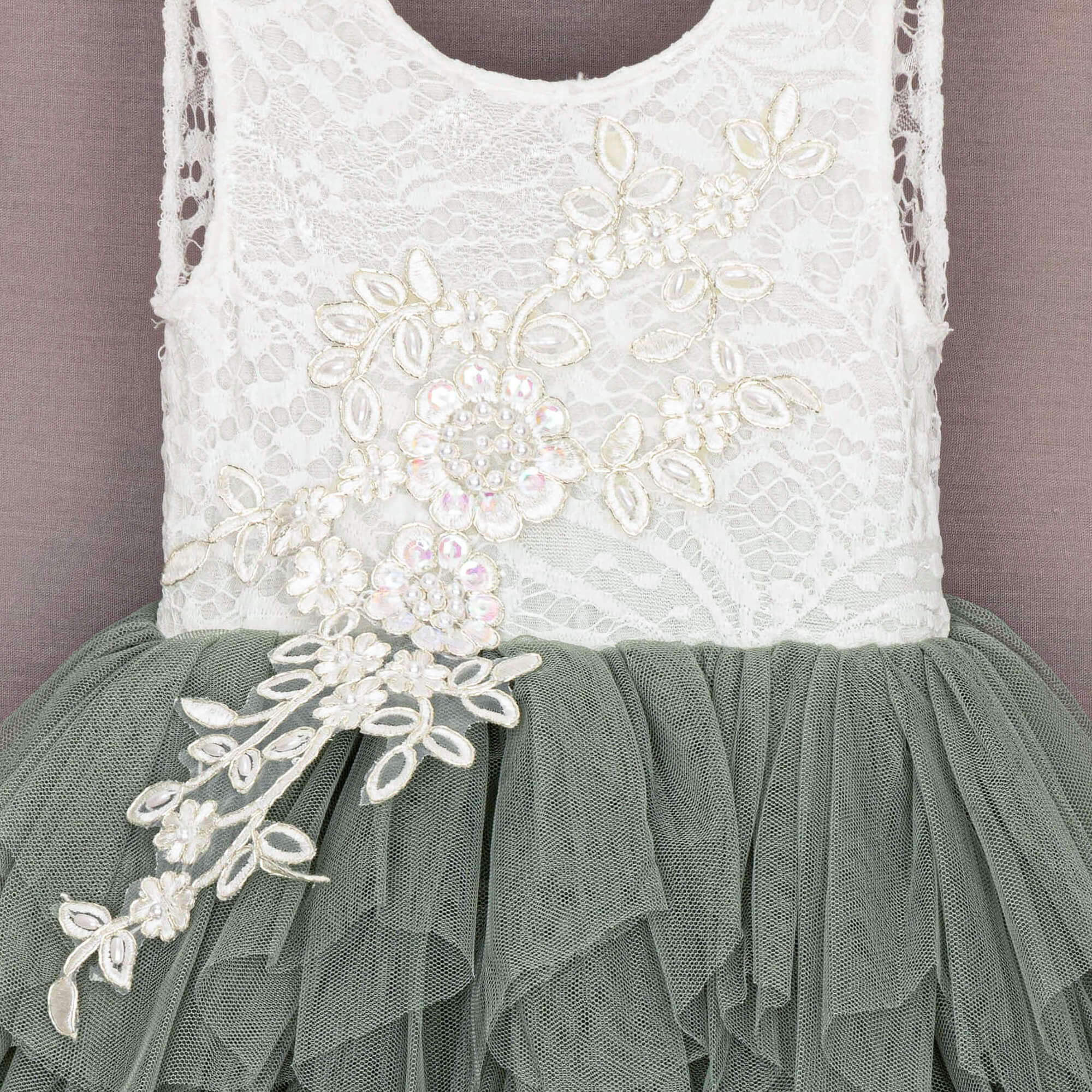 Close up of the sequin and pearl applique