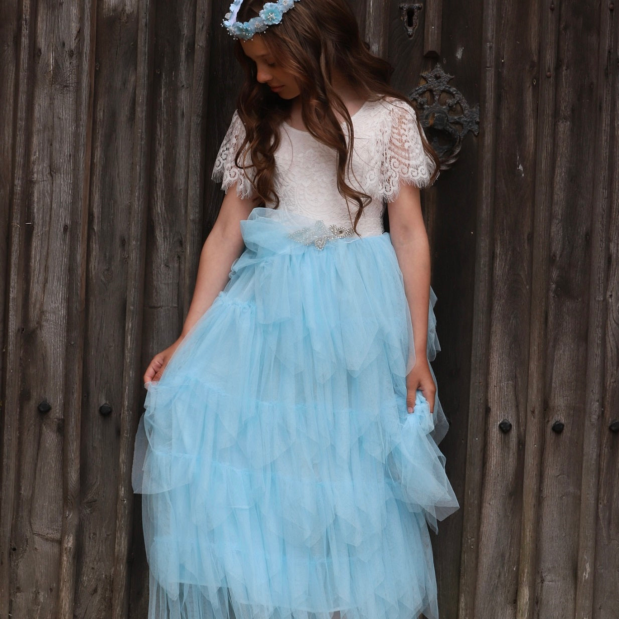Girl holding dress