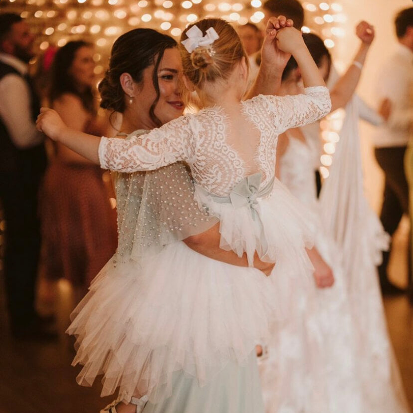 Lady with flower girl dancing