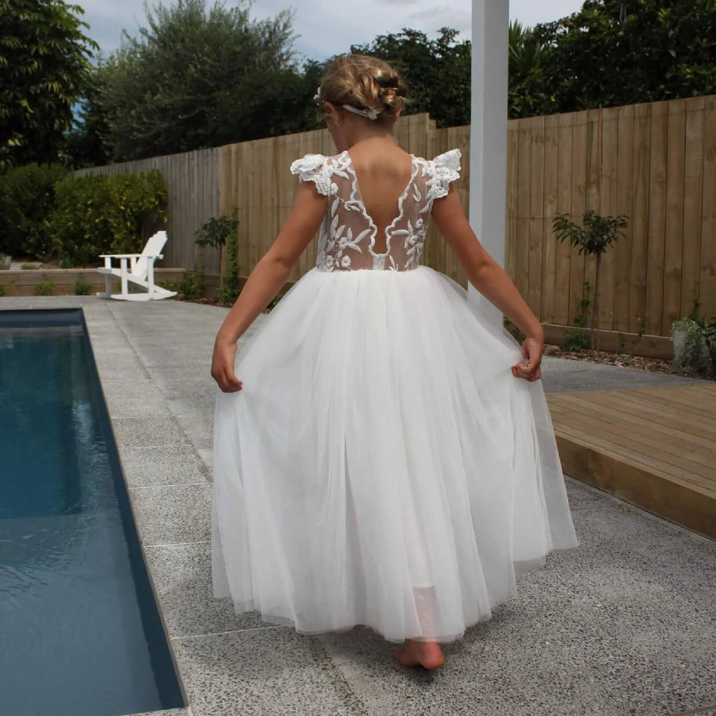 Pretty girl stood around pool