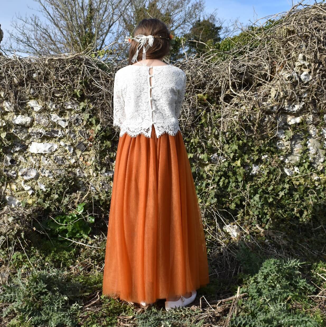 Girl looking at fence