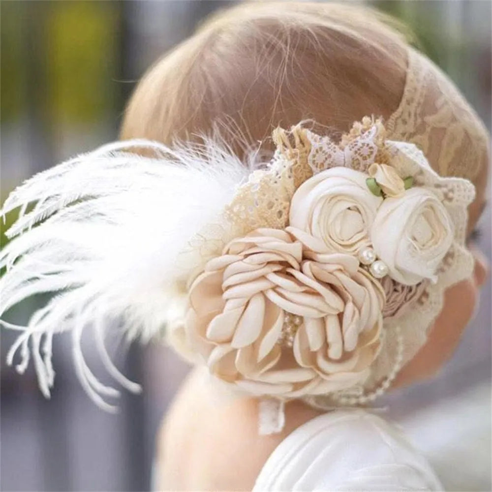 baby wearing elora head piece