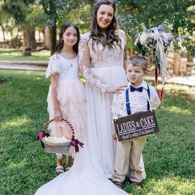 Bride with children at wedding