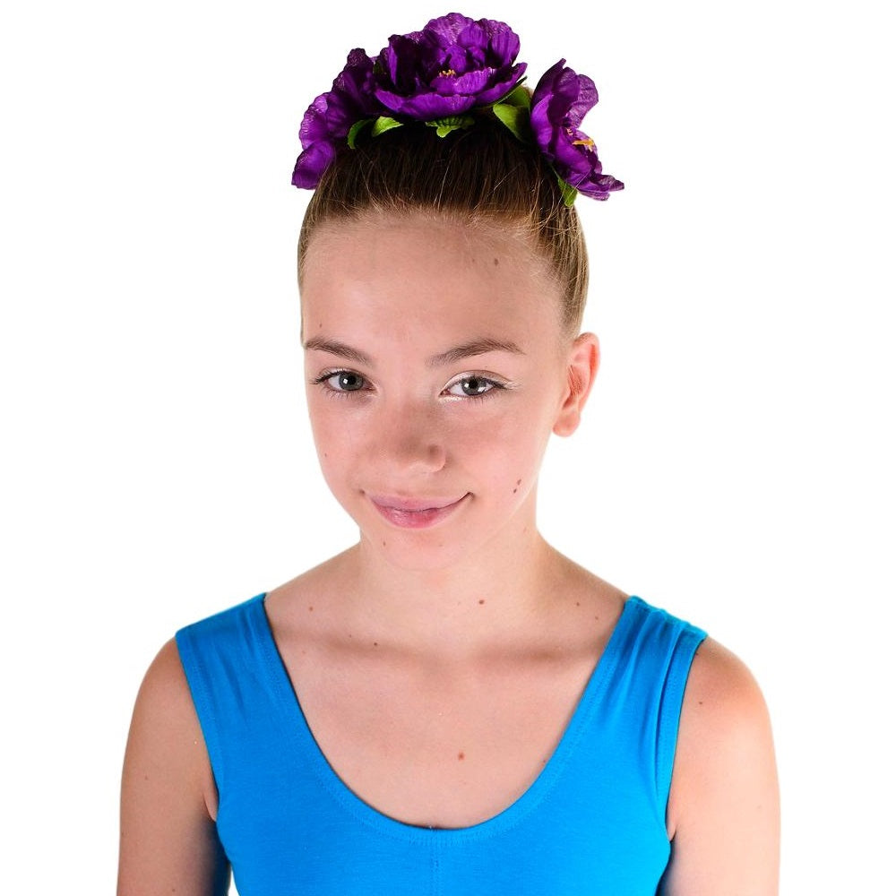 girl wearing a purple pansy hair garland from The Fairy Princess Shop