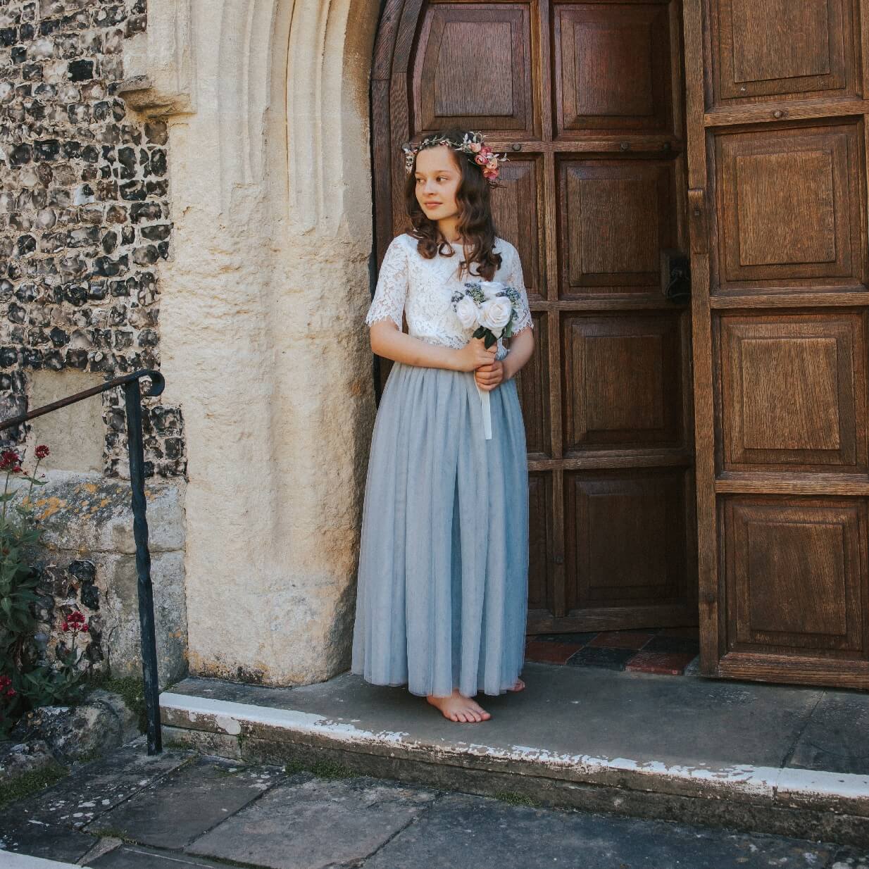 flower girl in church doorway