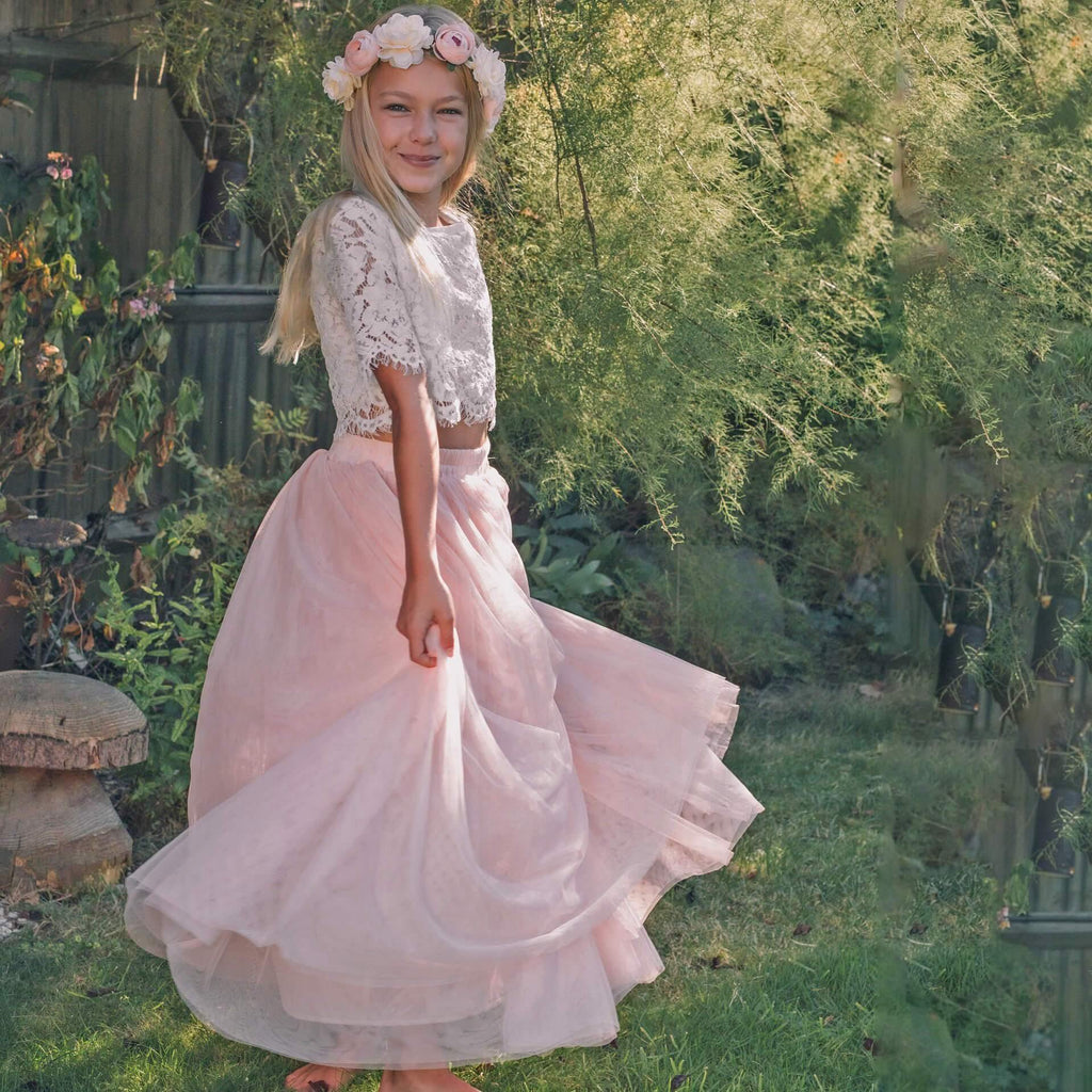 Girl in garden wearing a party outfit