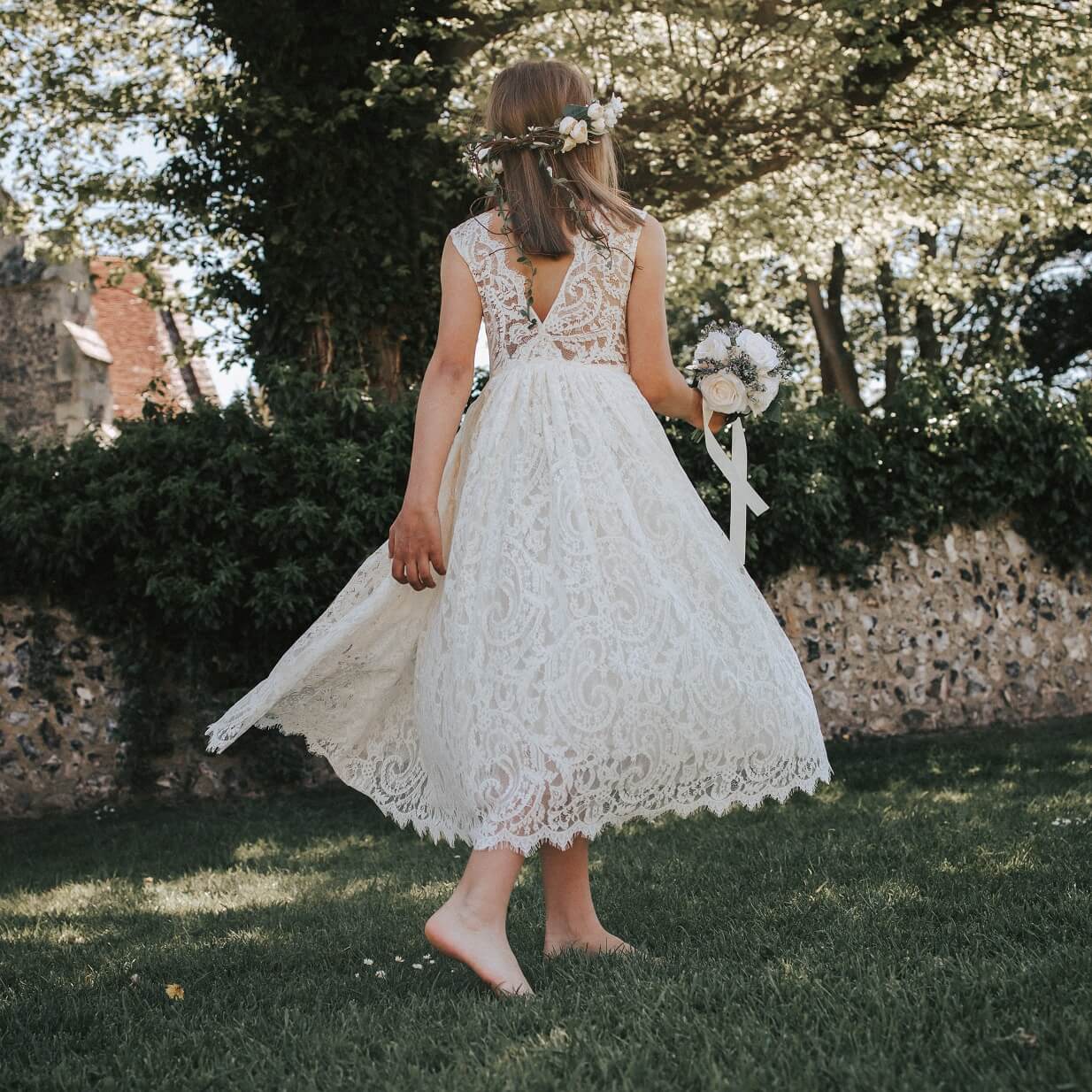 Girl walking away in church grounds