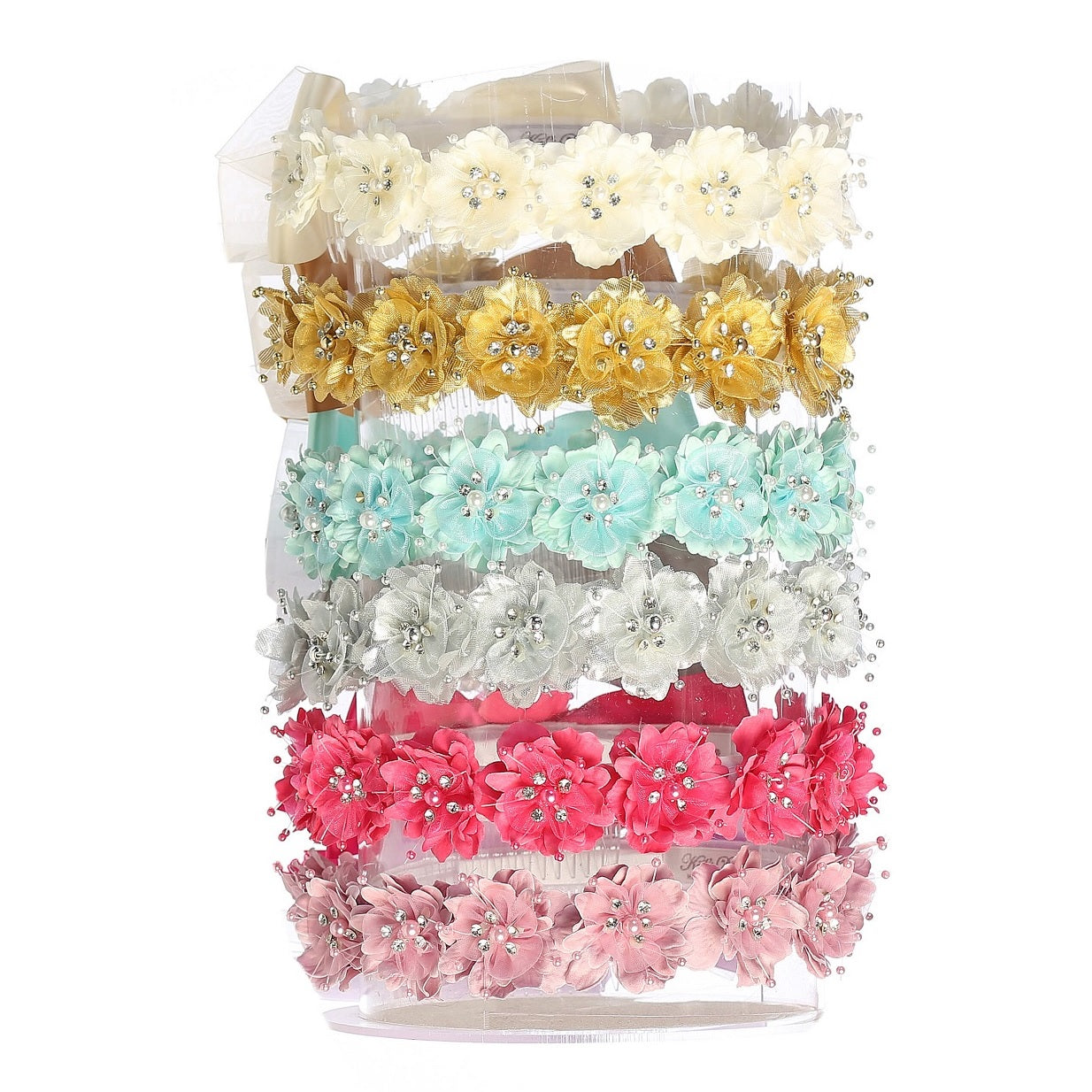 Fabric flower garlands in ivory, gold, white, and pink