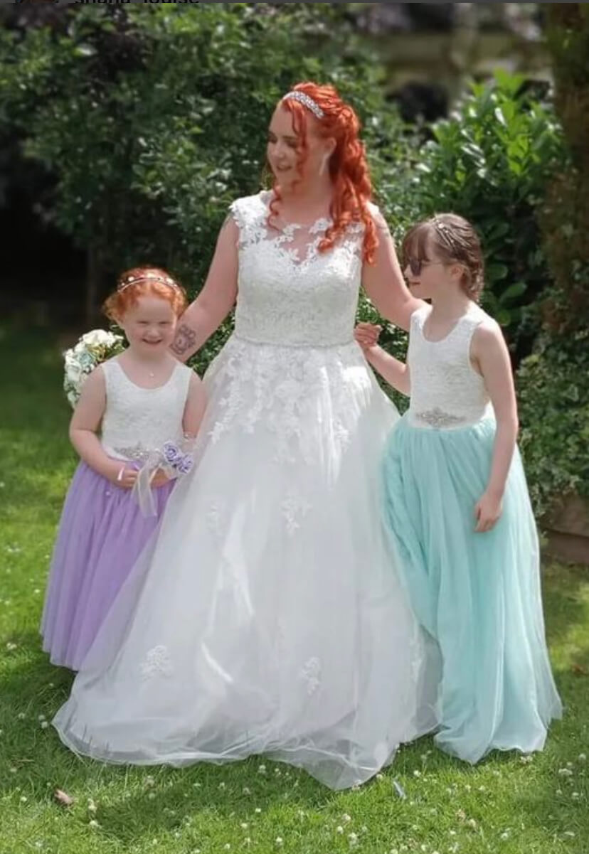 Beautiful photograph of bride and flower girls