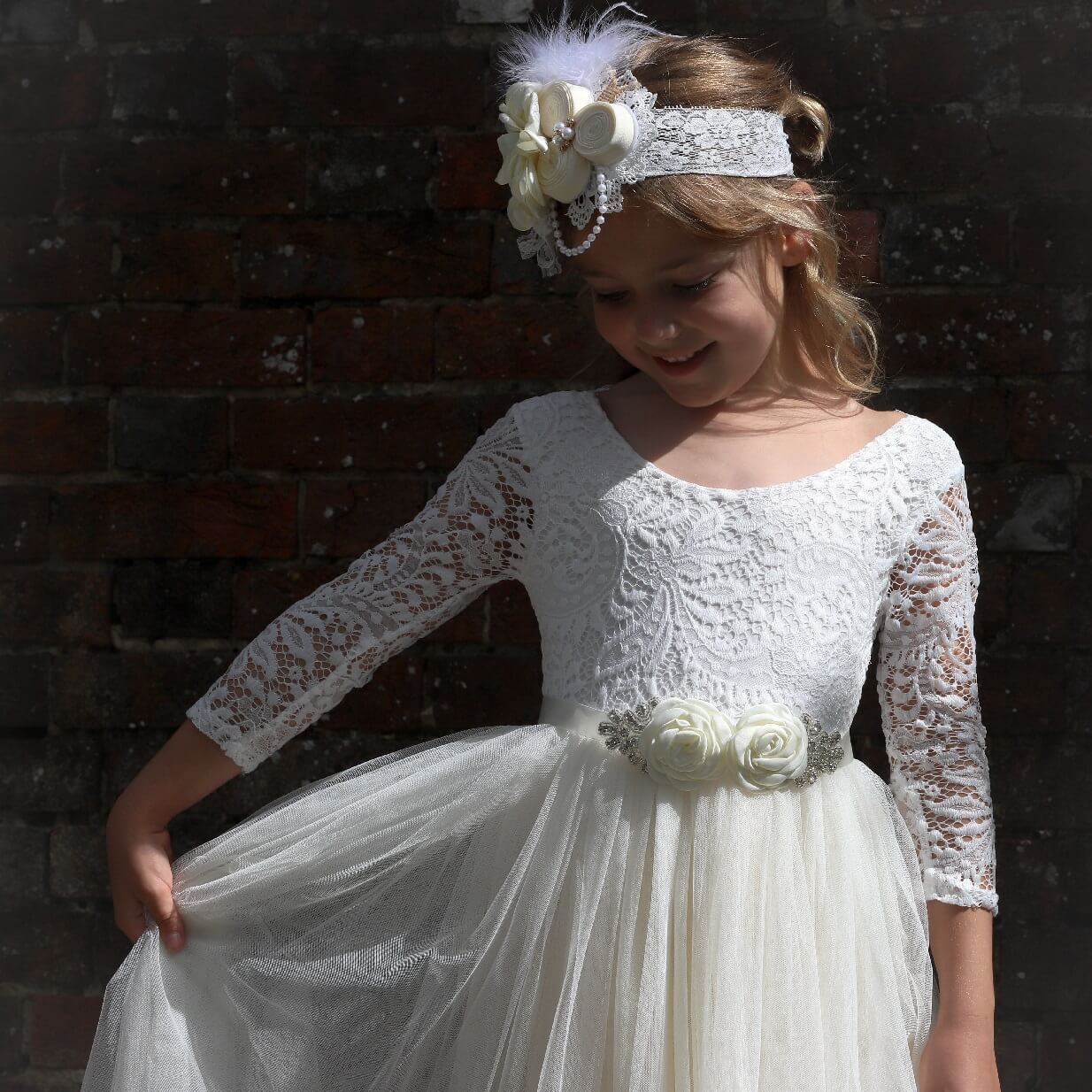 Young child happy wearing her dress