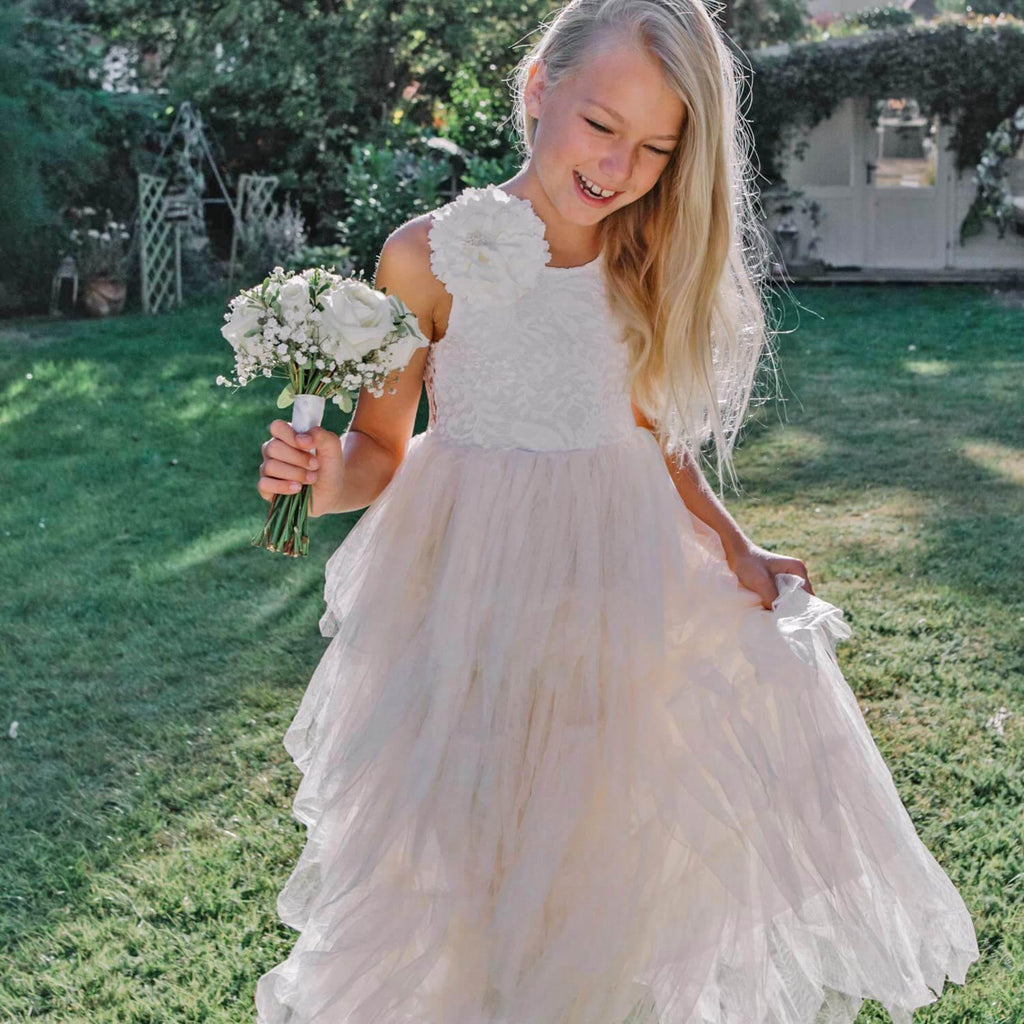 Girl wearing Sleeveless Bohemian Spirit Dress in  Ivory