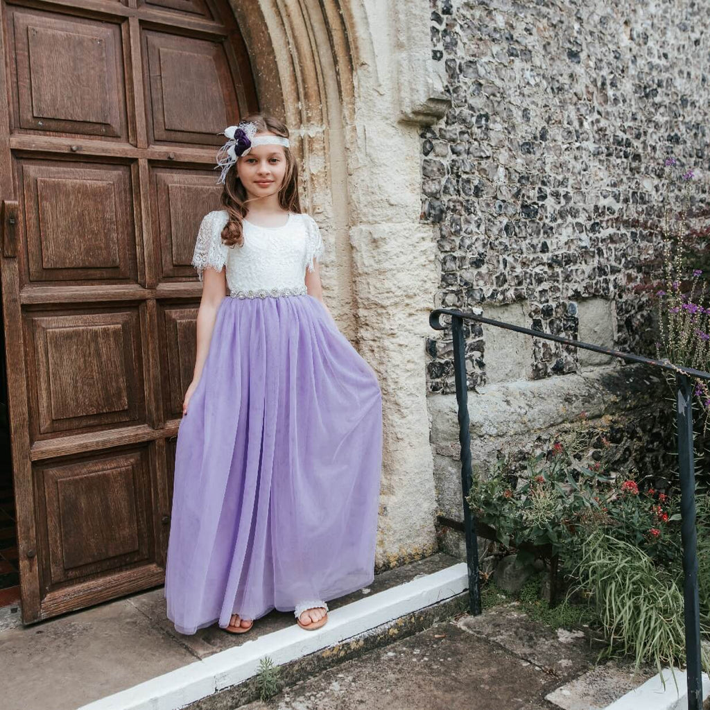 flower girl stood in church doorway