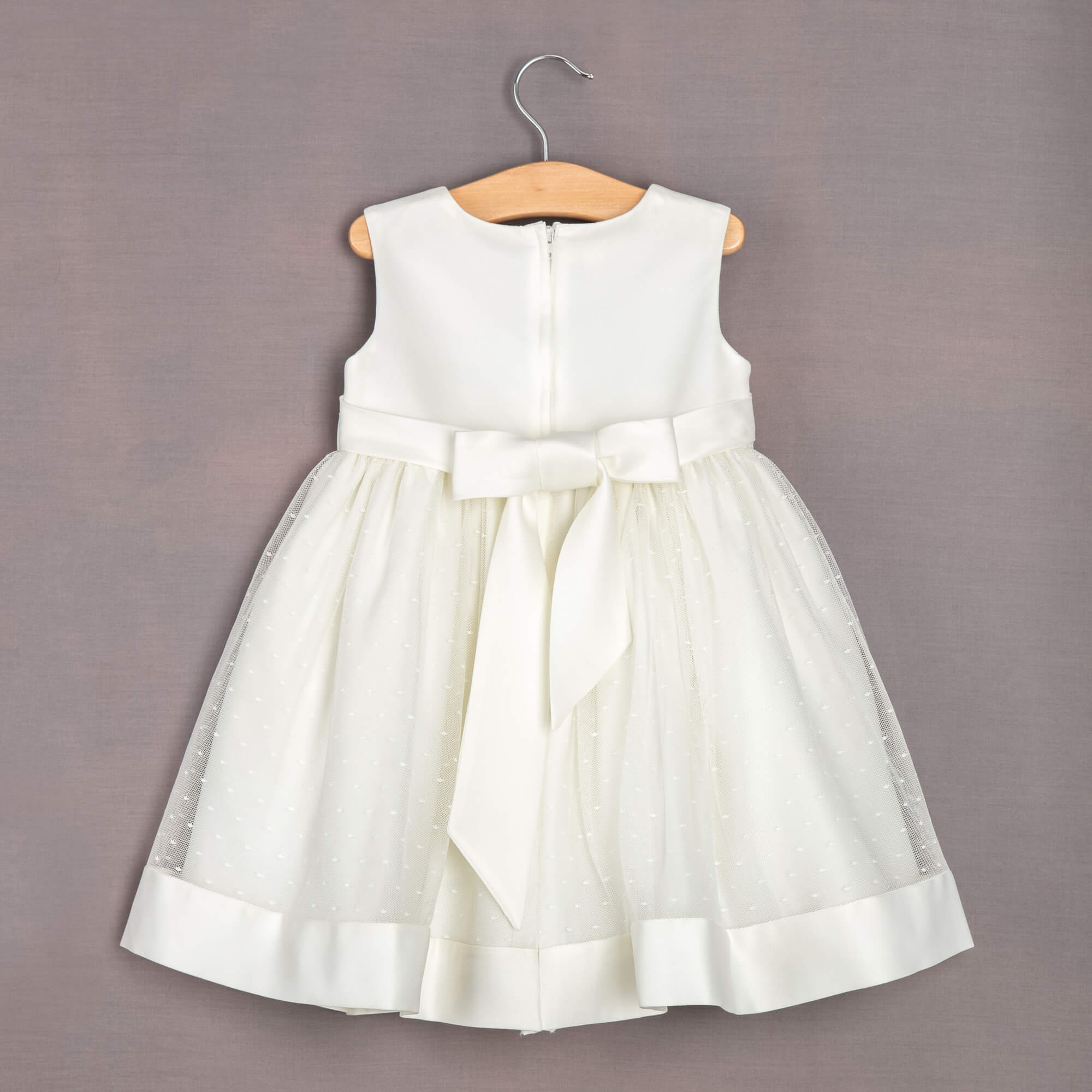 Grace dress hanging on hanger