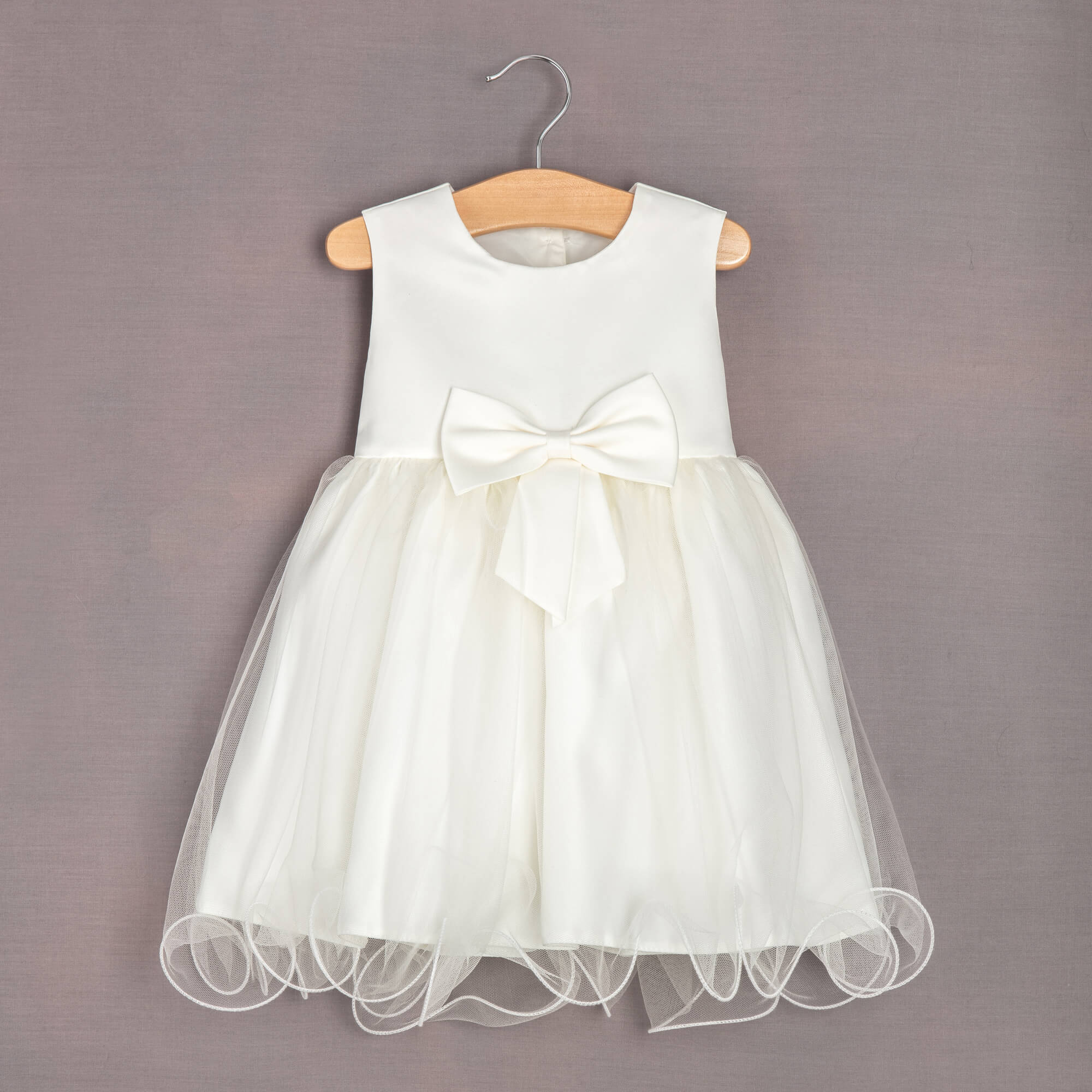 ivory pretty dress on hanger