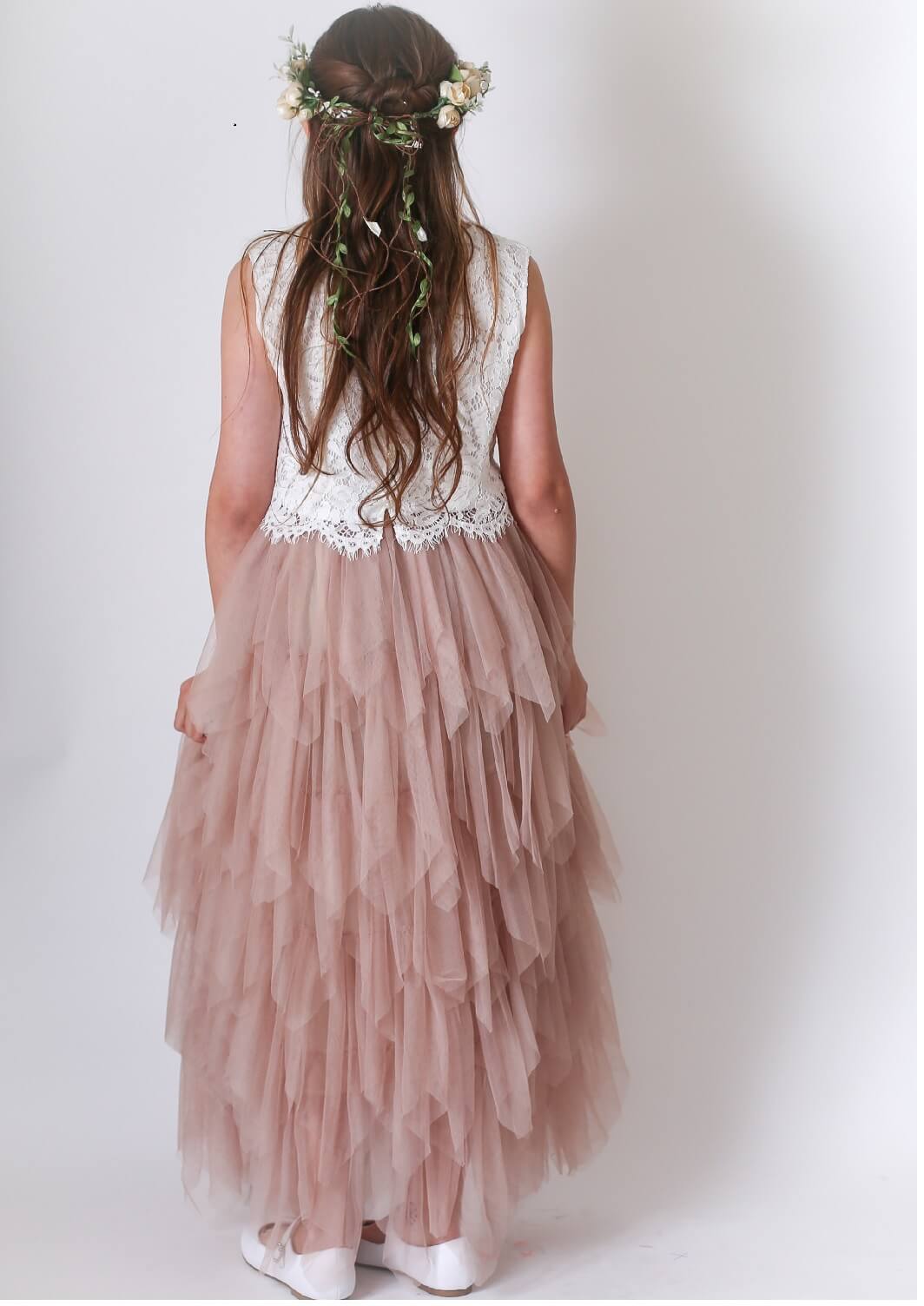 Rear details of set showing long hair and garland trailing