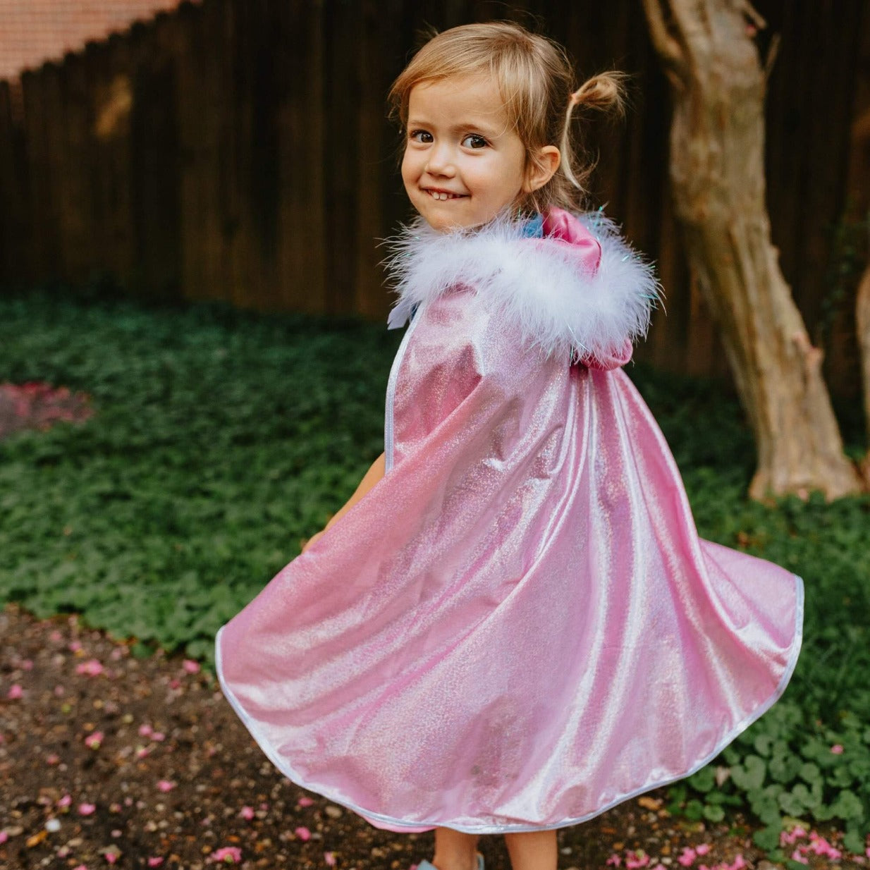 Young girl in princess cape