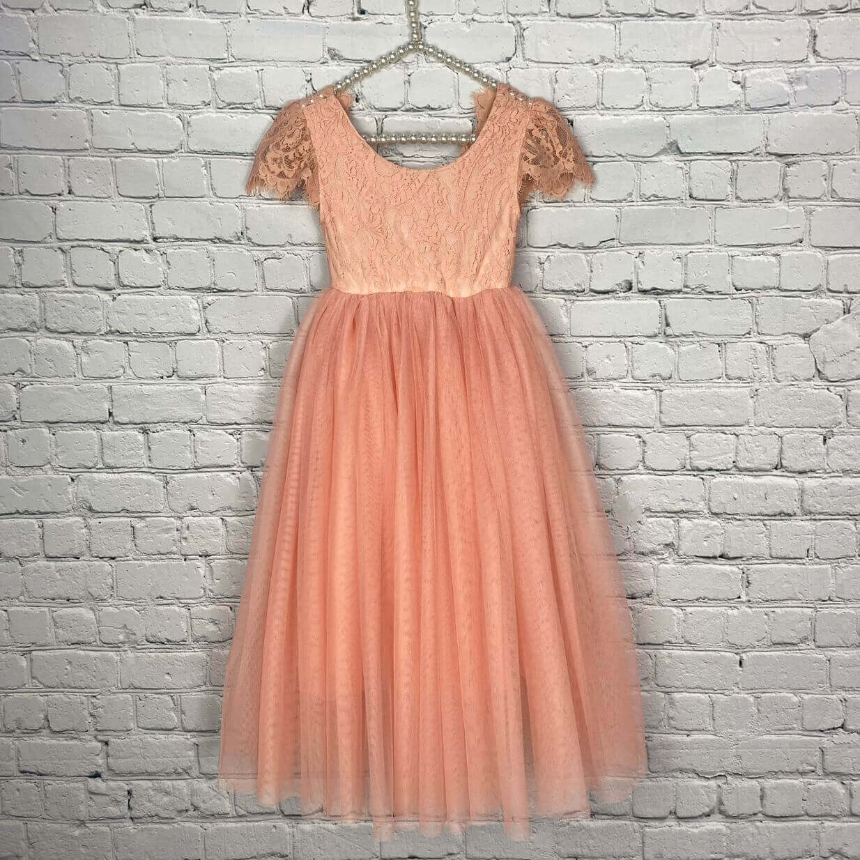 Salmon coloured flutter dress