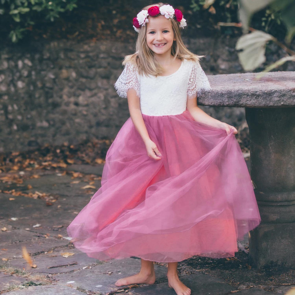 Girl in pink and white dress