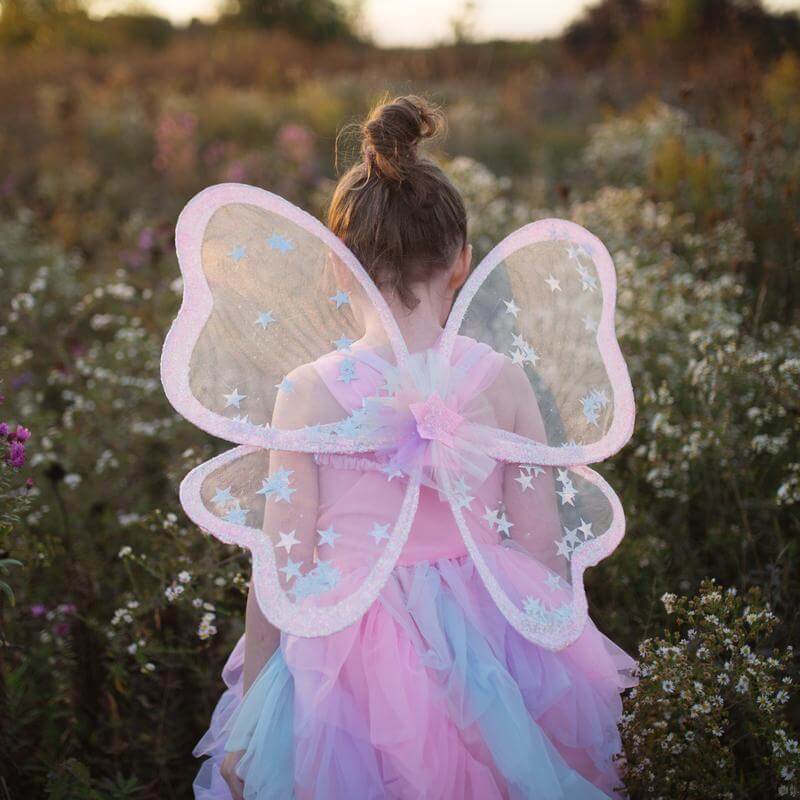 Girl wearing glitter wings