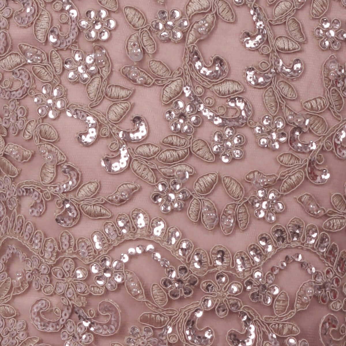 beaded detail on a girls mauve coloured dress